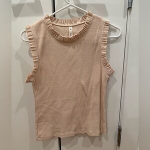 cream tank top with small frills